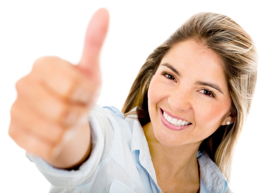 Happy woman with thumbs up - isolated over a white background Happy woman with thumbs up - isolated over a white background