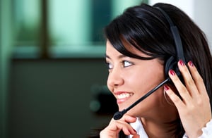 friendly customer service woman smiling at her office